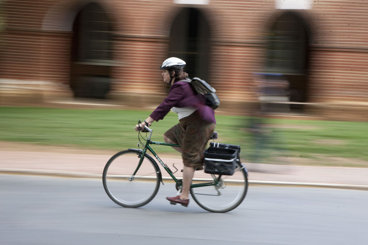 Woman riding a bicycle on the road