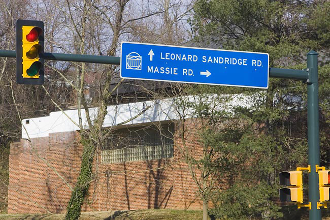 Street sign pointing to Massie Road and Leonard Sandridge Road