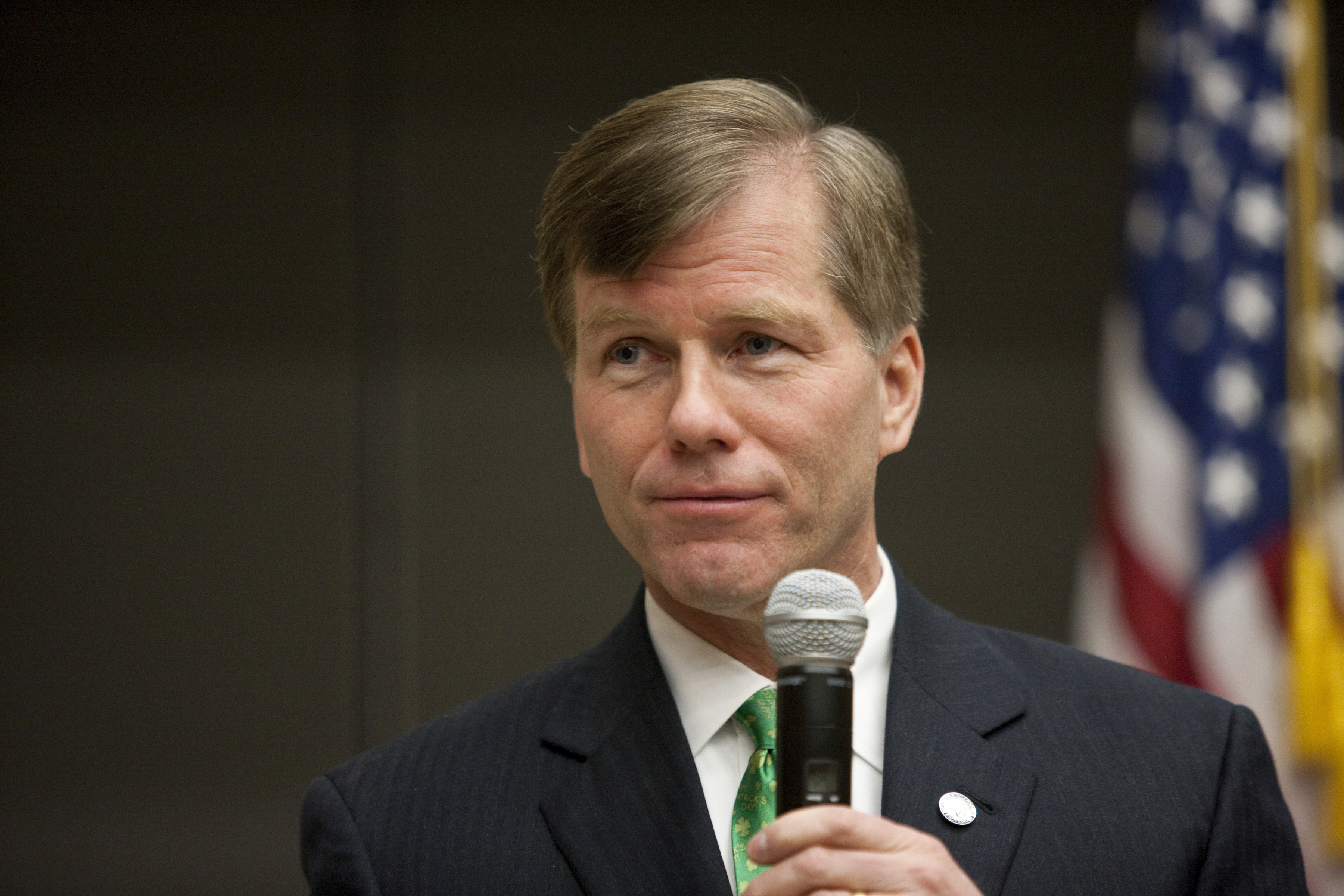 Virginia Gov. Robert F. McDonnell speaking to a crowd holding a microphone
