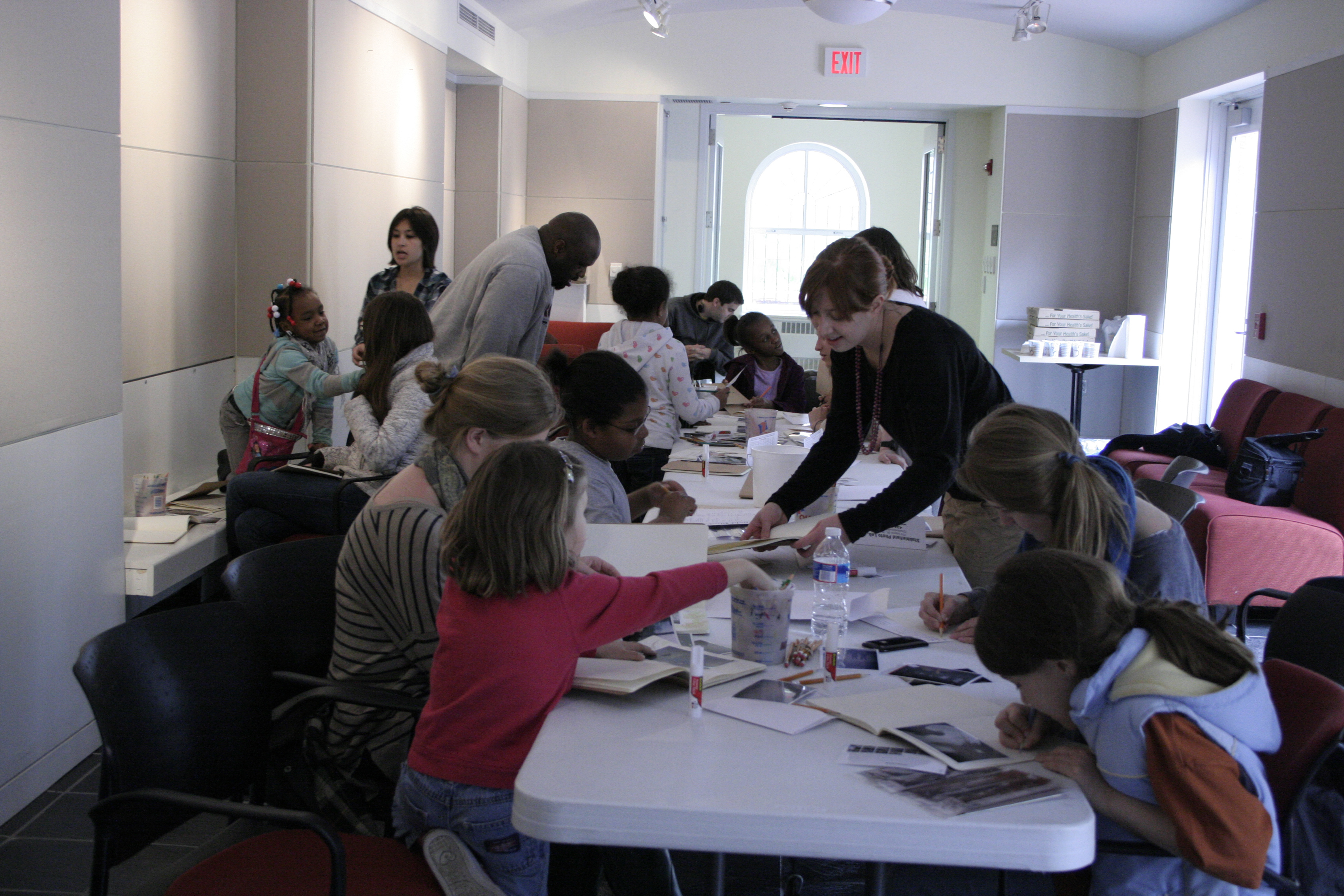 UVA students work with elementary kids at tables