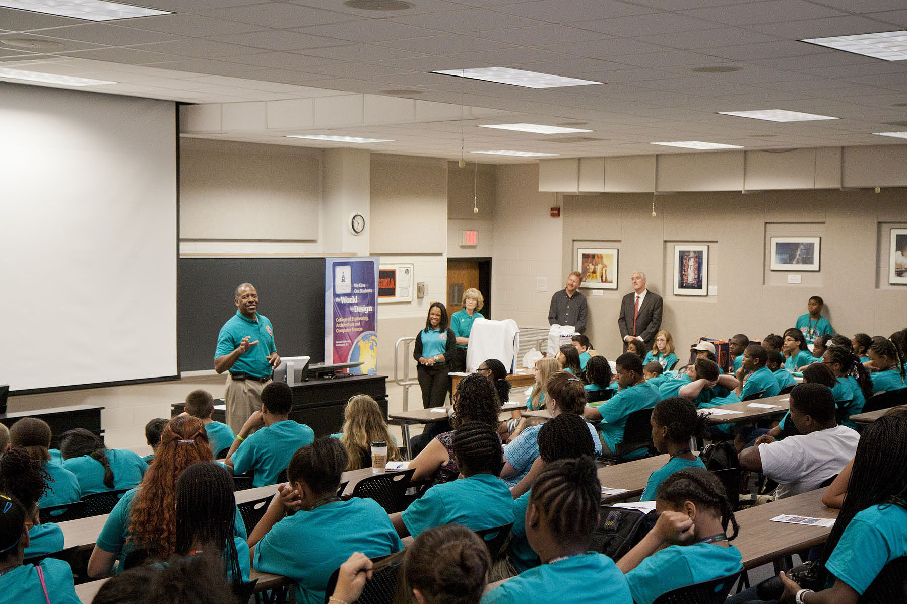 Dr. Bernard Harris speaks to students at a camp