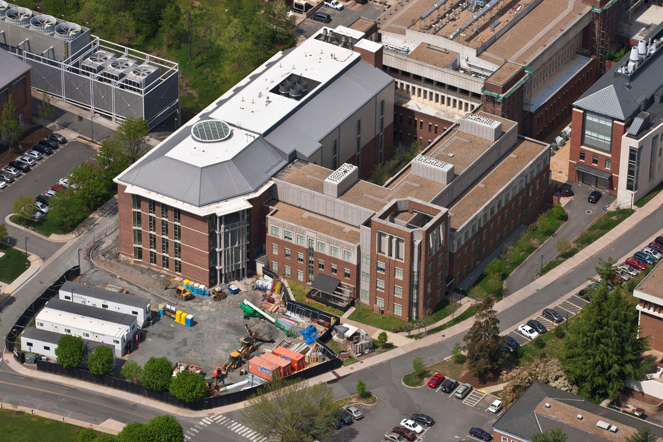 Aerial view of the multi story brick Physical and life sciences research building