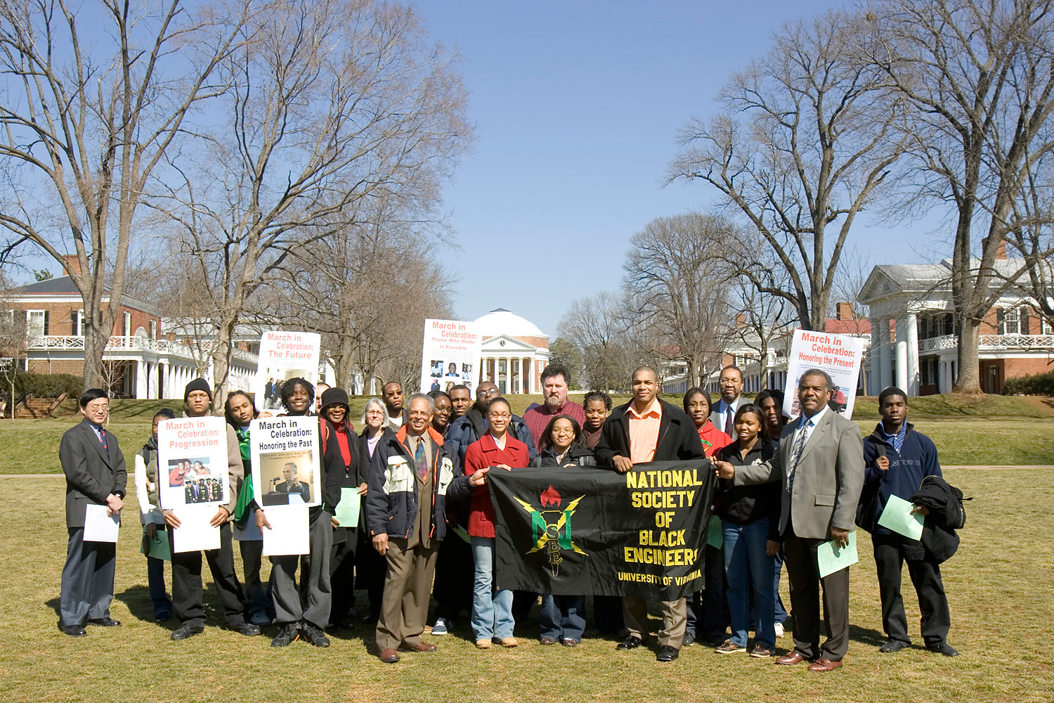 Group photo with a banner that reads: National Society of Black Engineers