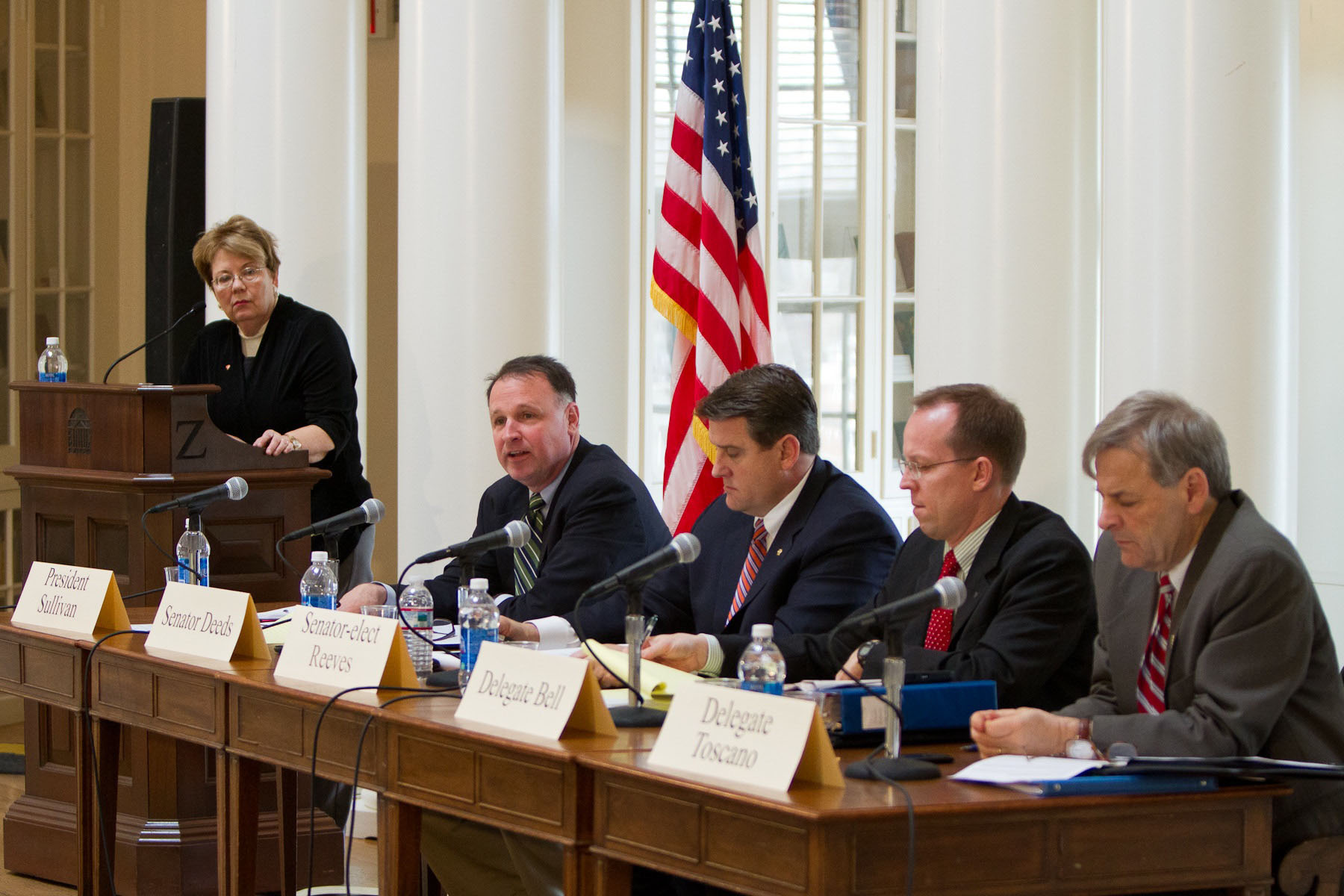 Panelists from left to right: President Teresa A. Sullivan, State Sen. Creigh Deeds,  Sen.-elect Bryce Reeves, Robert Bell, and David Toscano