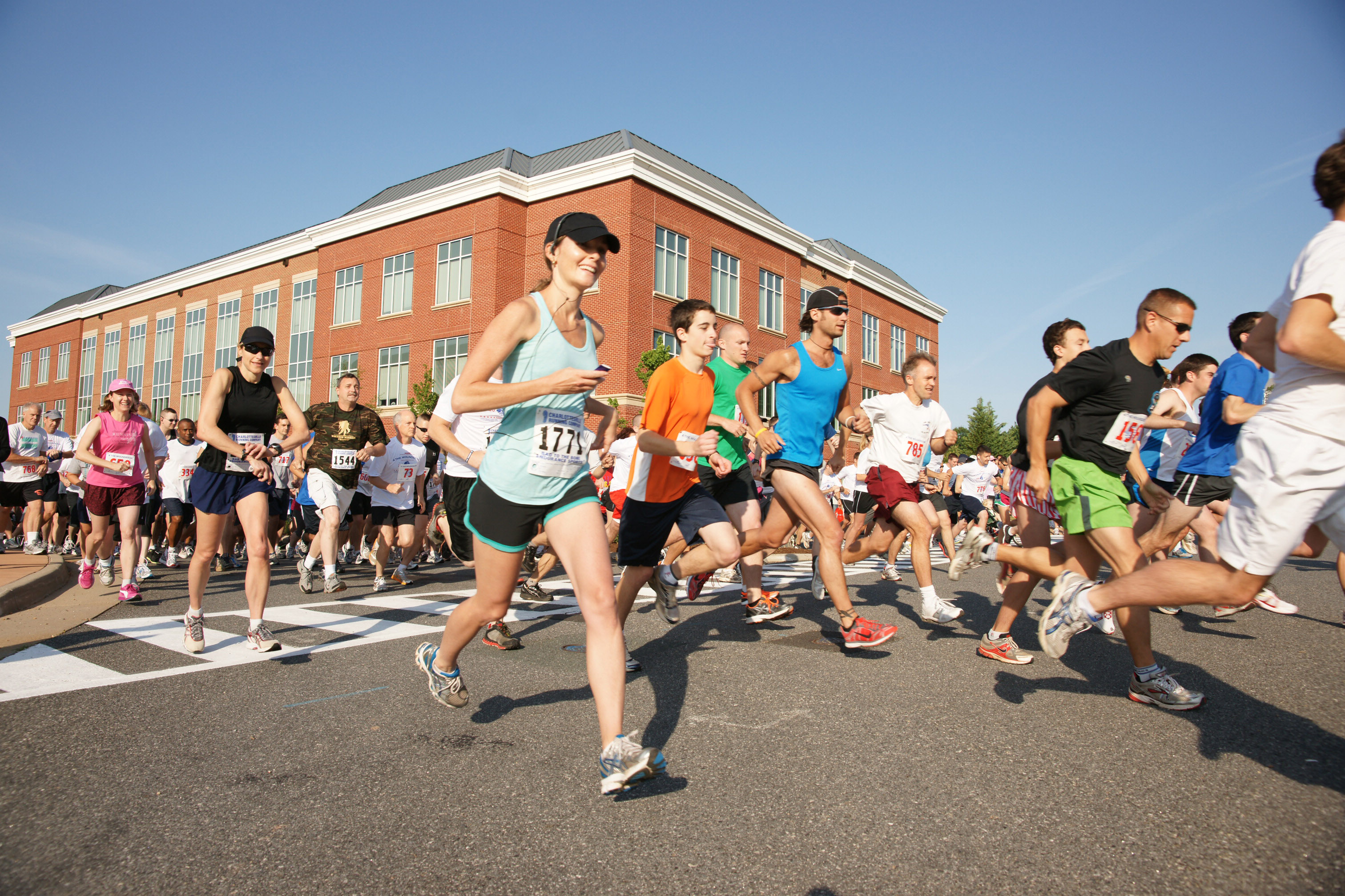 People running on the street during the 4 the Wounded 5k