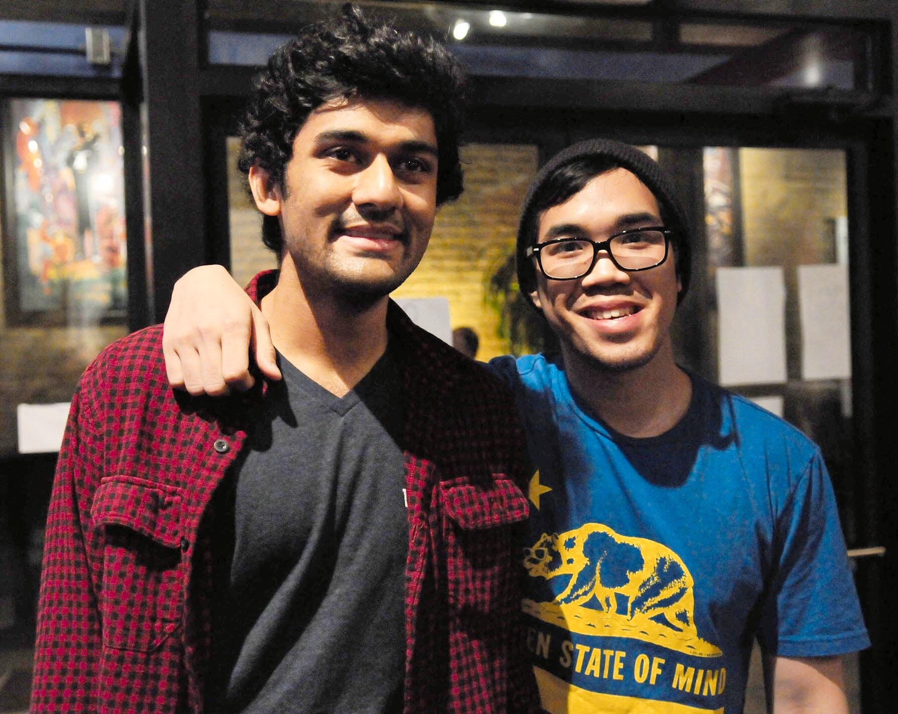 Ashutosh Priyadarshy and Duylam Nguyen-Ngo stand next to each other smiling at the camera