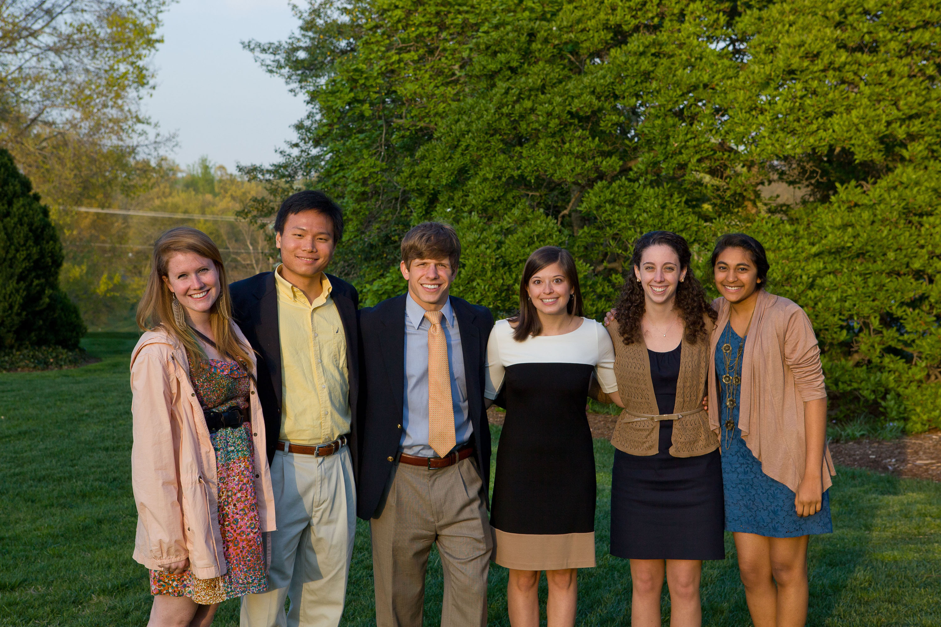 Tony Li, second from left stands with a group of students for a group photo