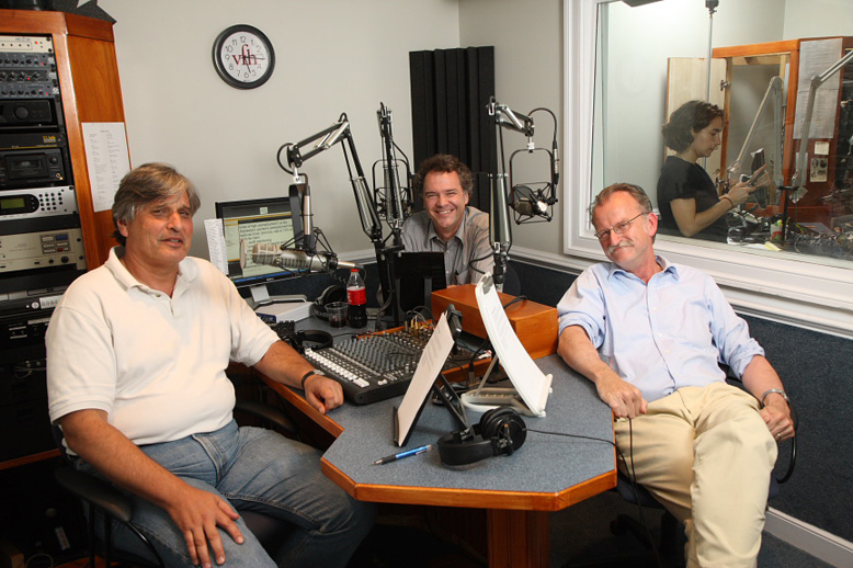 Three men sitting in a radio station recording station.  Left to right: Brian Balogh,  Edward L. Ayers and Peter Onuf