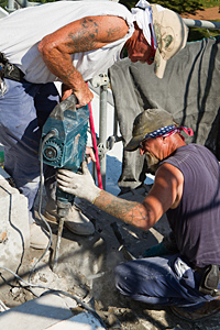 Men drilling a whole in the roof of the Rotunda