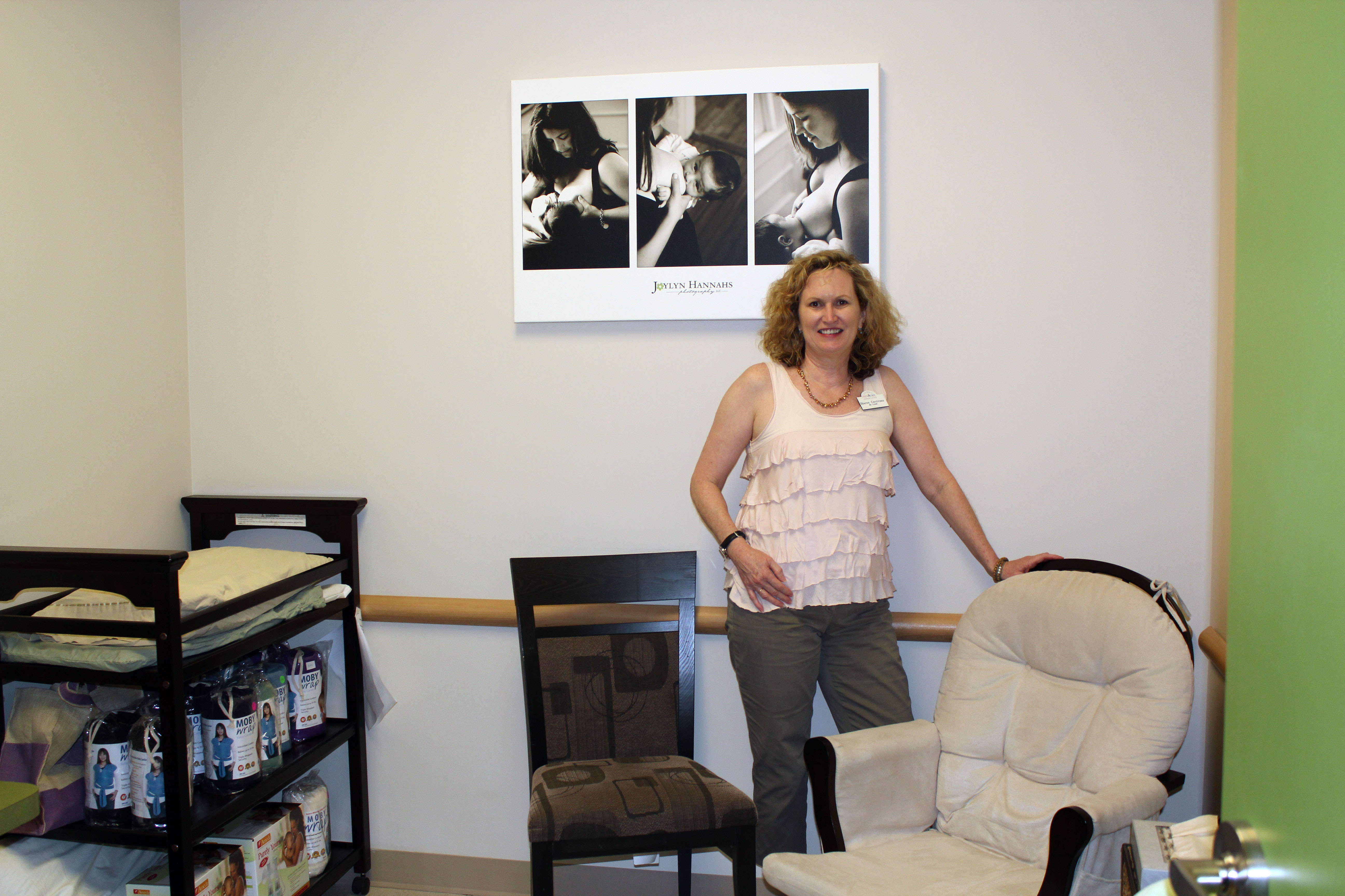 Sharon Corriveau stands in her office