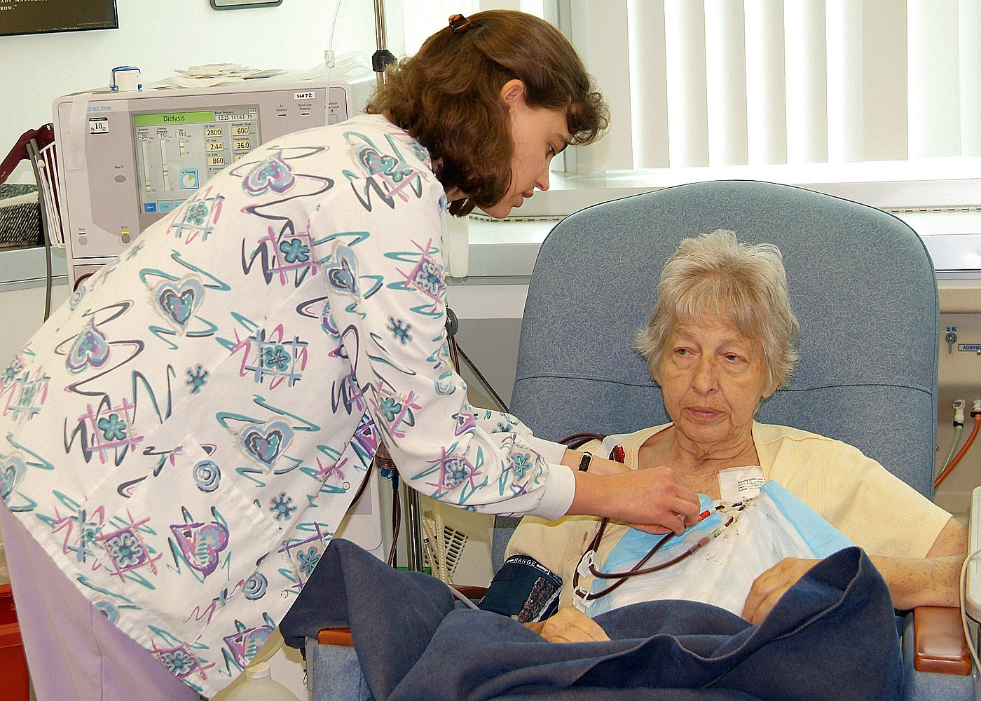 U.Va. Nurse helps a dialysis patient