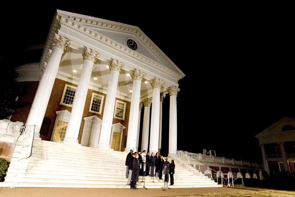 A Cappela group standing on the steps of the Rotunda singing