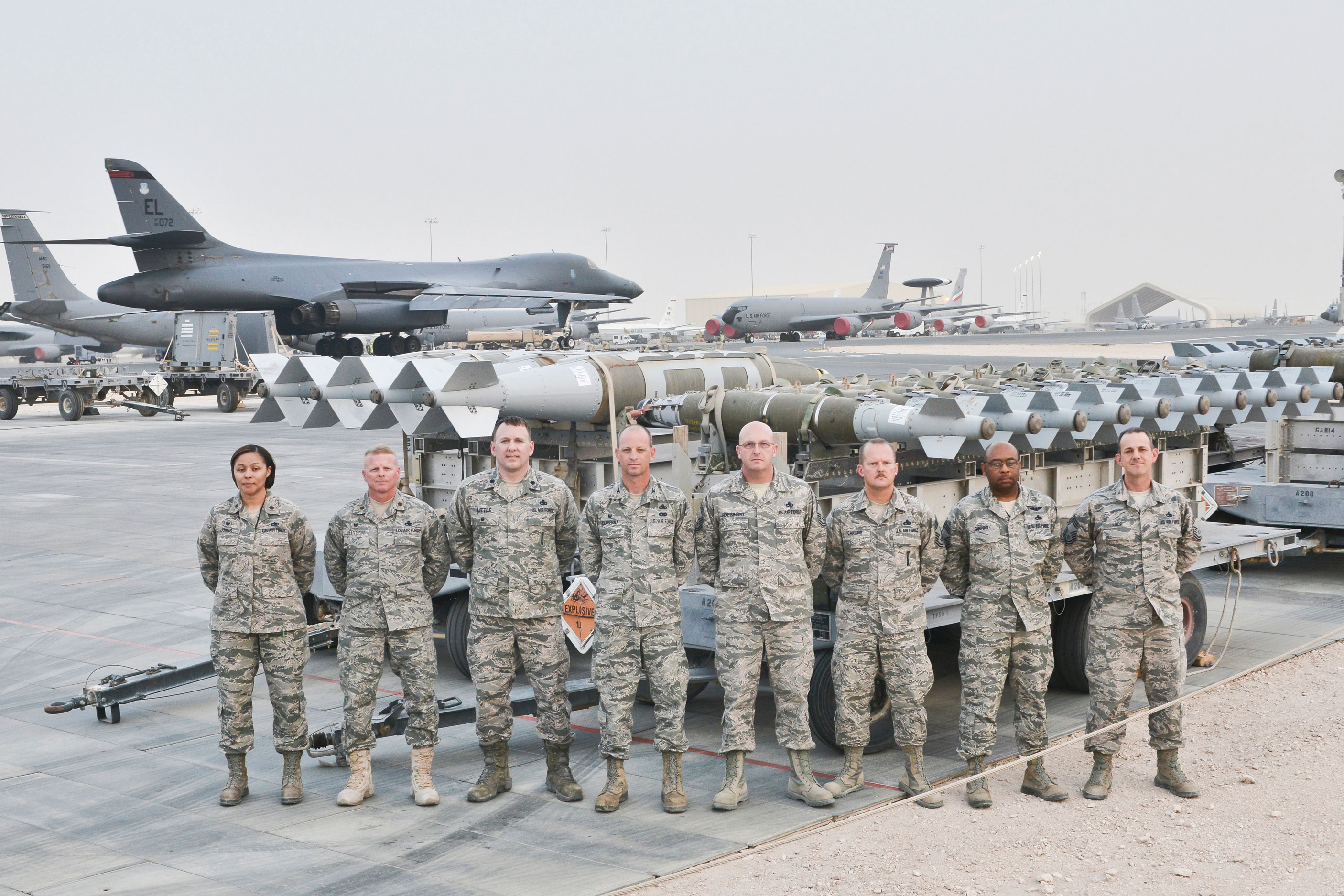 Nevah Jones stands with his Air Force Group at Al Udeid Air Base in Qatar