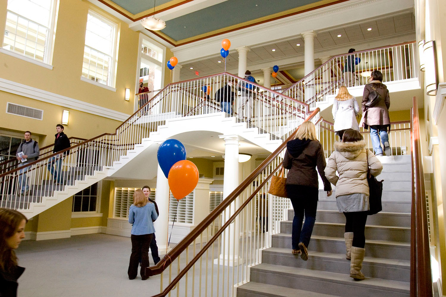 People walking up the steps of Rouss Hall
