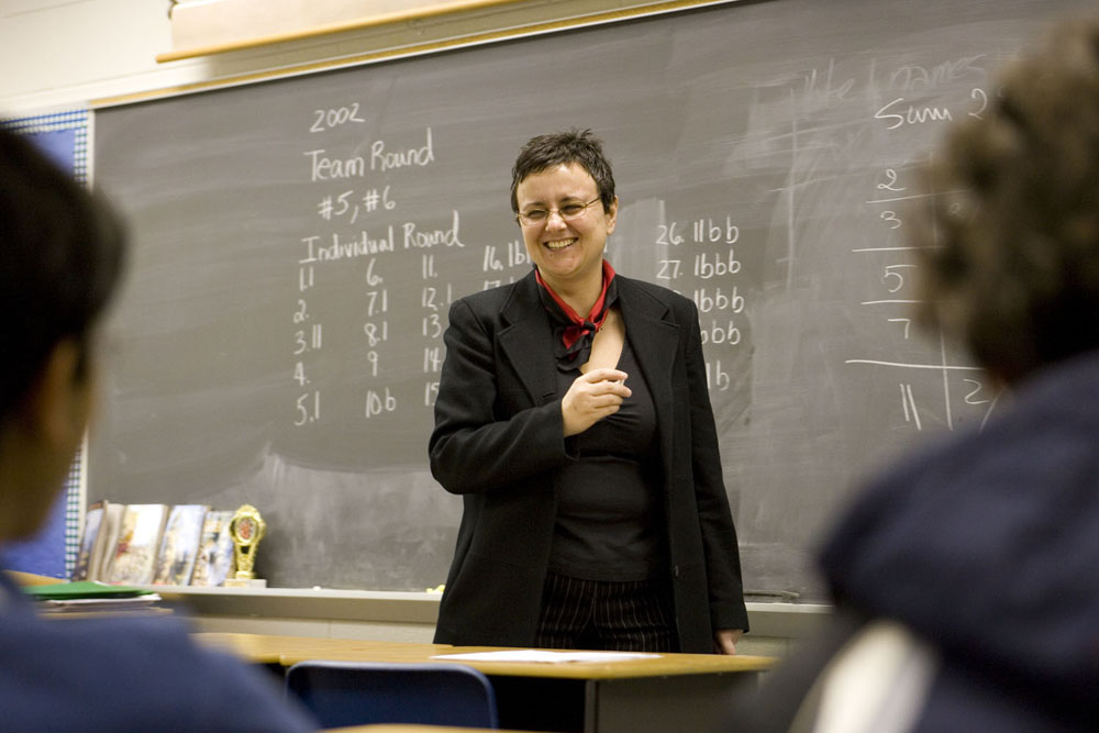 Irina Mittrea teaching a class from the chalkboard