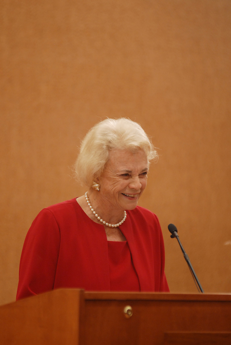 Sandra Day O'Connor speaking at a podium