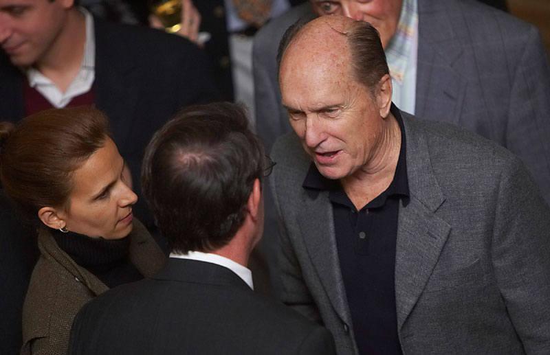 Robert Duvall talking to a man in the crowd