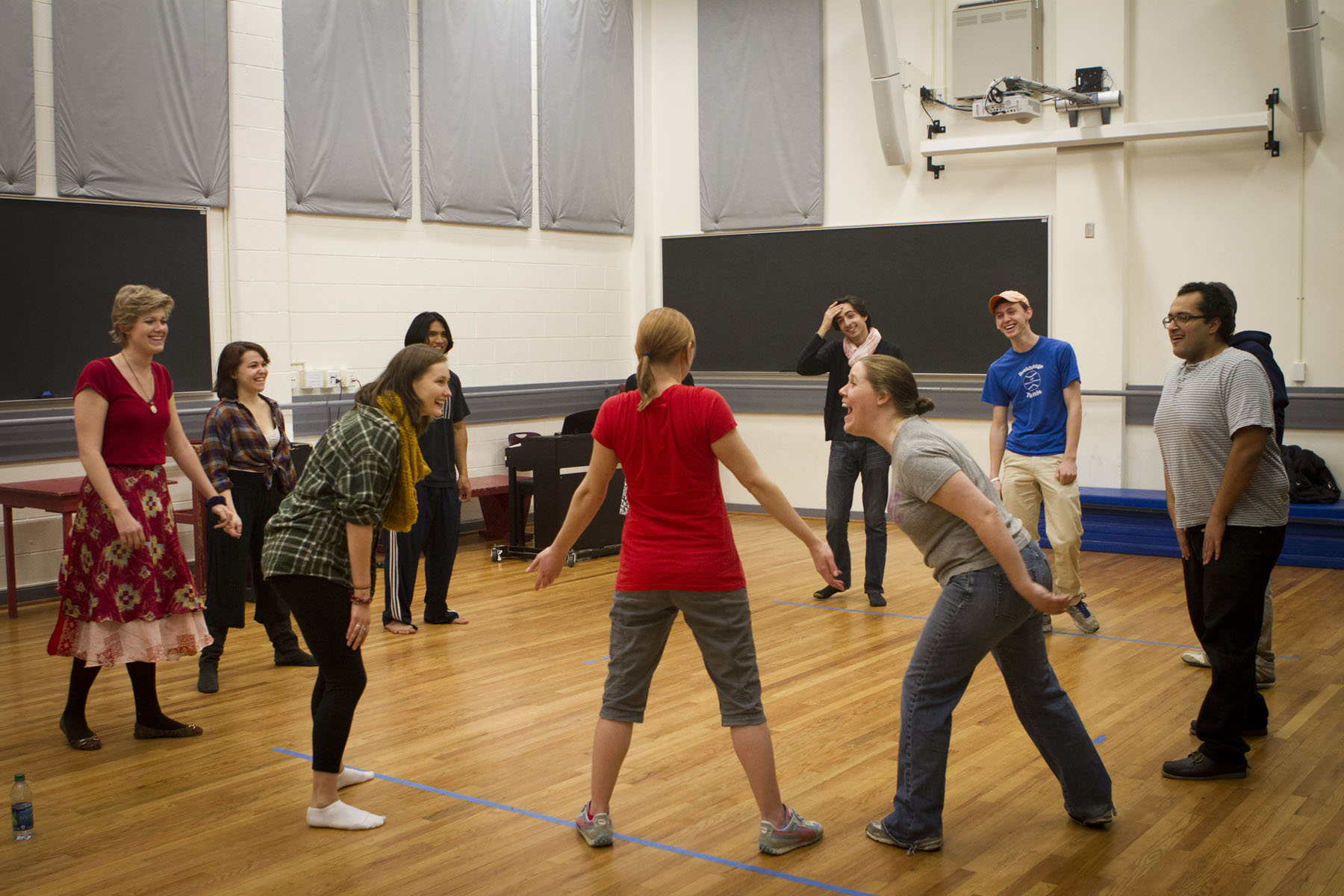 McLeod rehearses with students for a drama performance