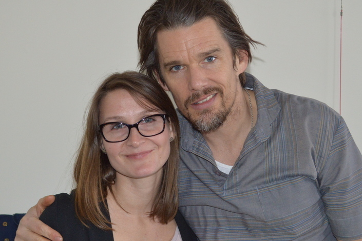 Eleanor Henderson, left, and Ethan Hawke, right, stand together smiling at the camera
