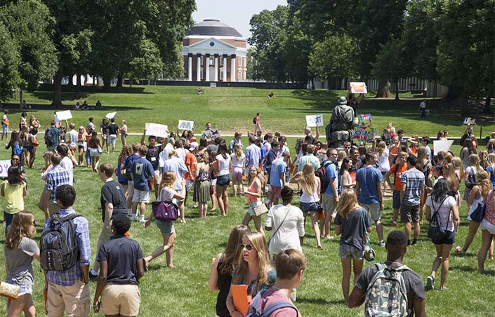 Students on the Lawn getting into orientation groups
