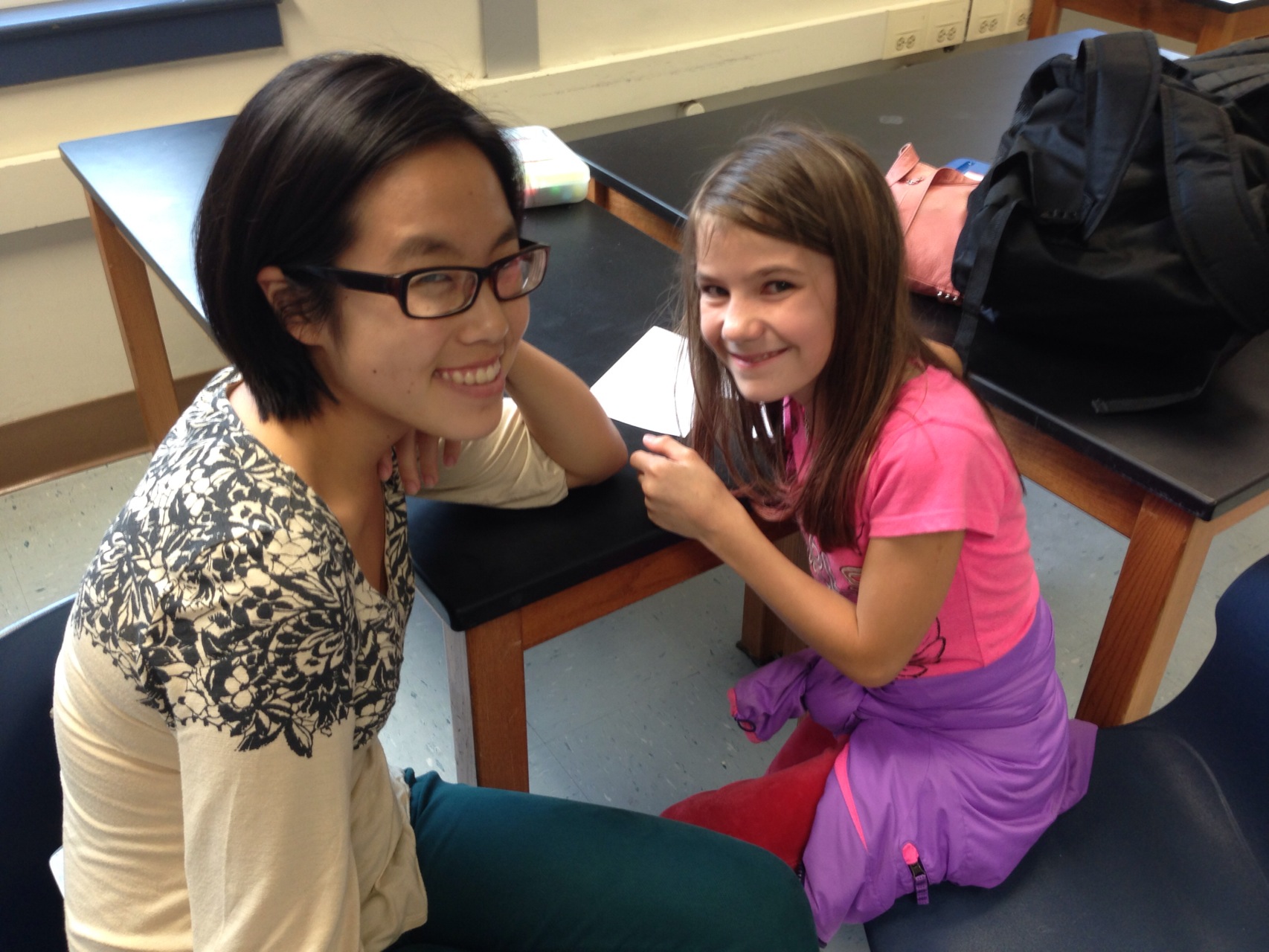 Eunice Kim, left, and her elementary mentee Albany Crawford, right