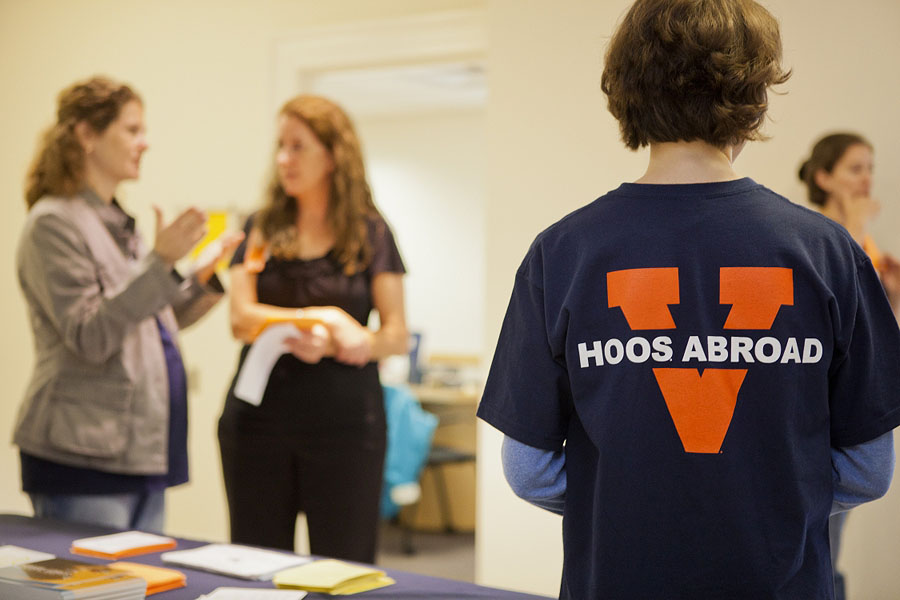 Woman wears a shirt that says Hoos Abroad