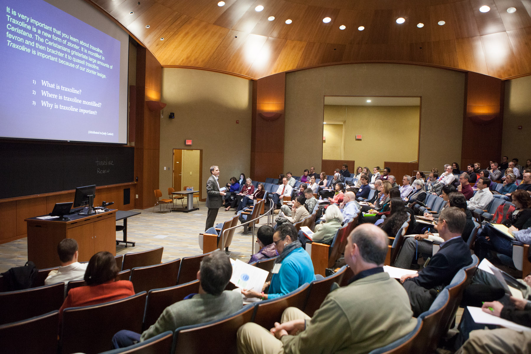 Lendol Calder speaking to a crowd during a presentation