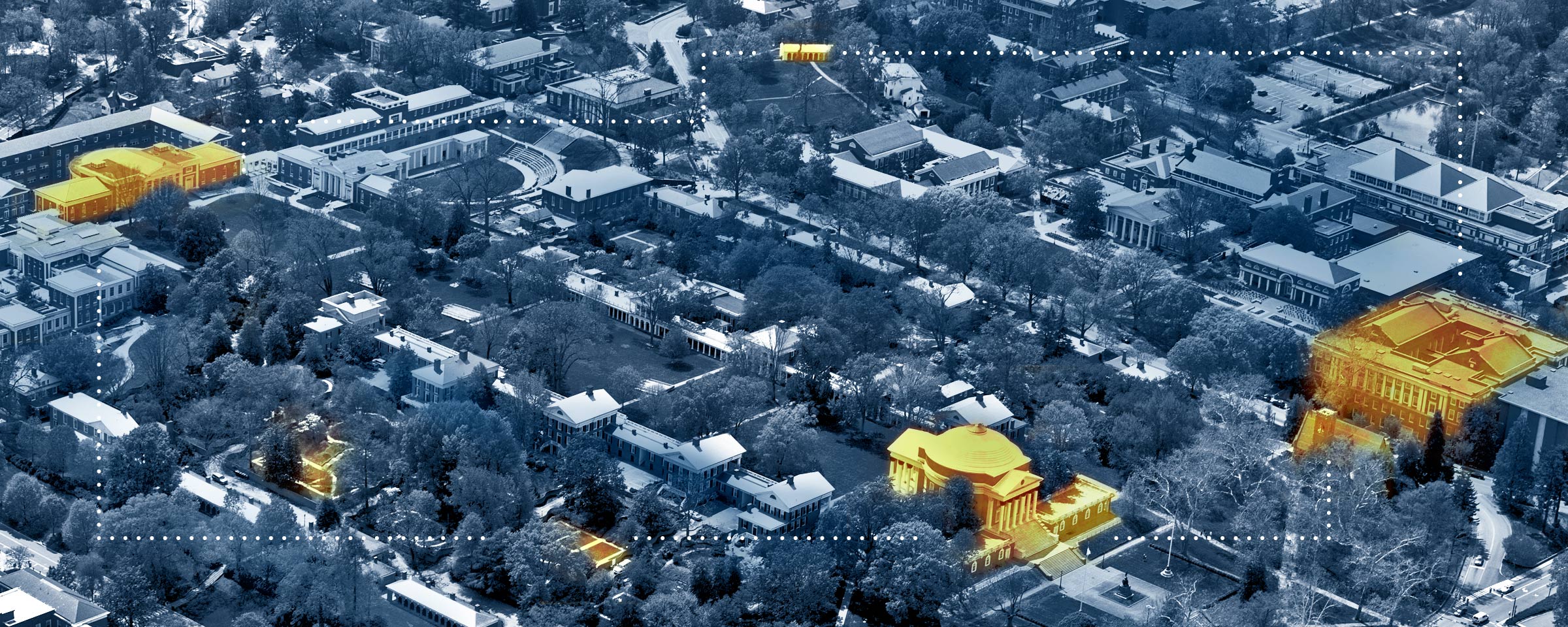 Aerial view of grounds with certain buildings highlighted in orange with white dotted line connected those buildings
