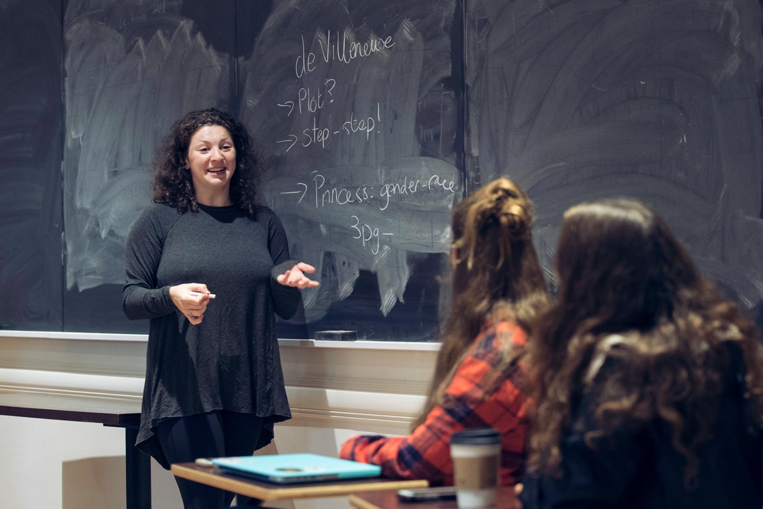 Saskia Feldman teaching at a chalkboard