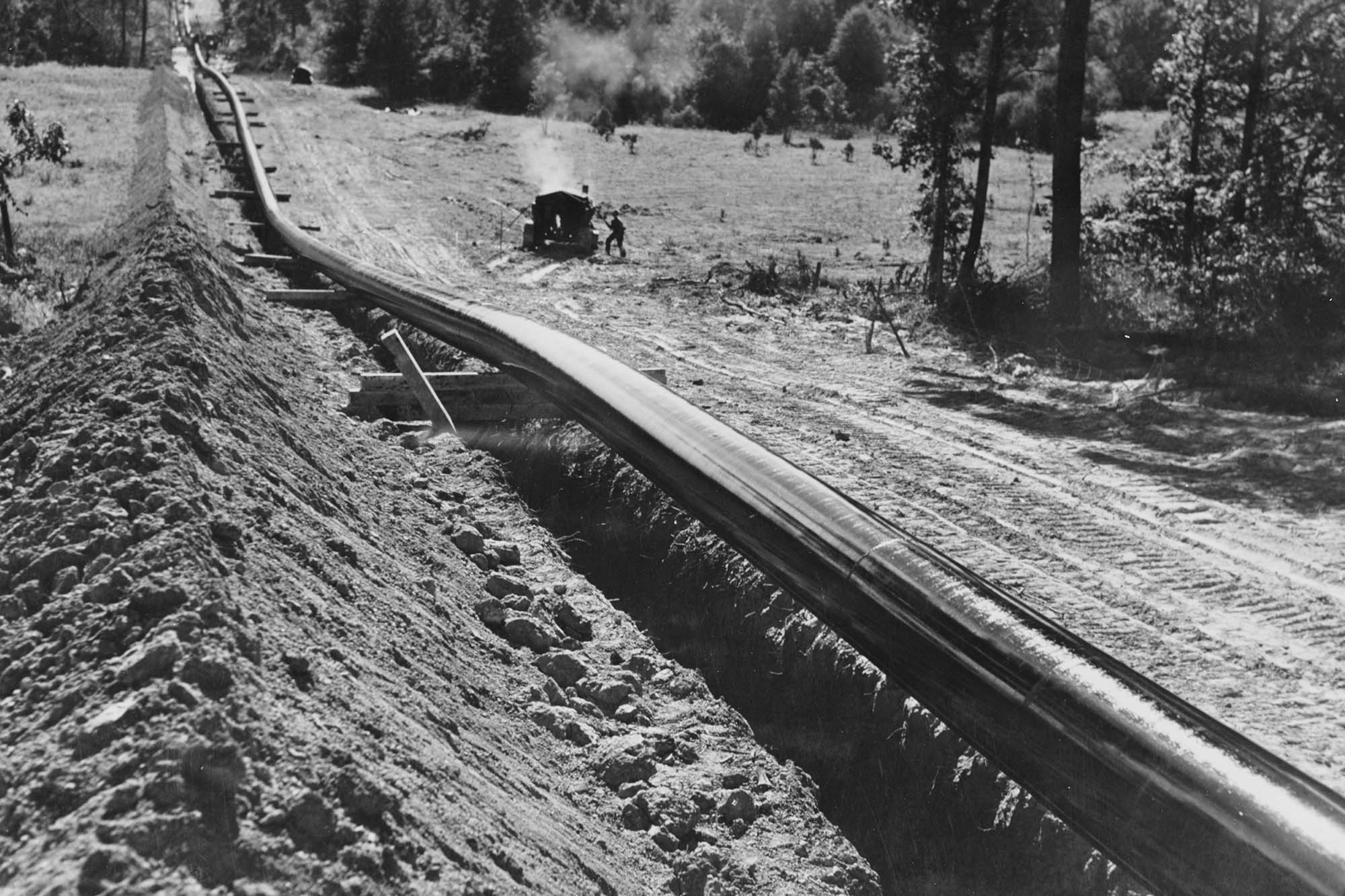 Black and white image of an oil pipeline
