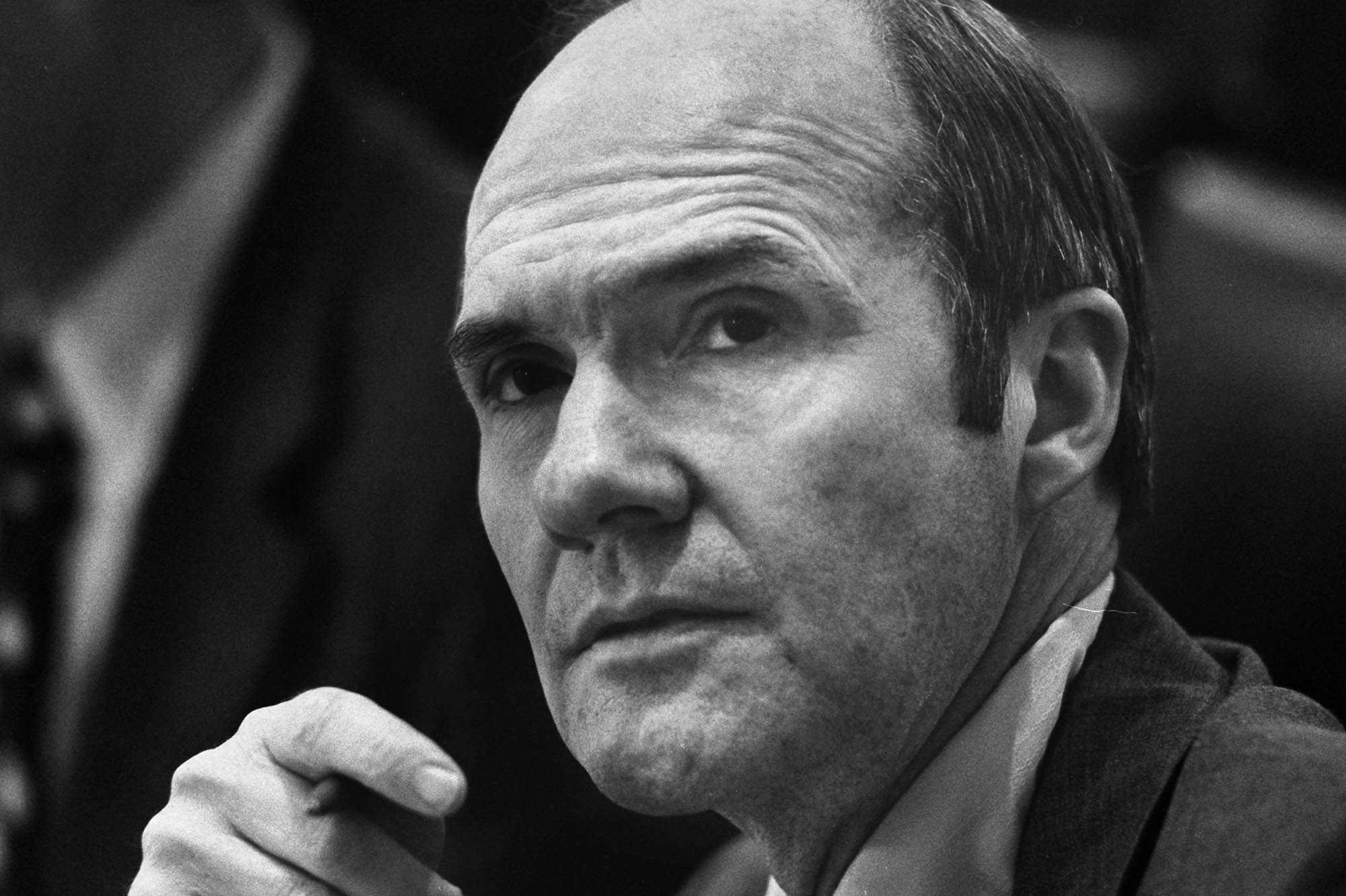 Brent Scowcroft sitting in a chair