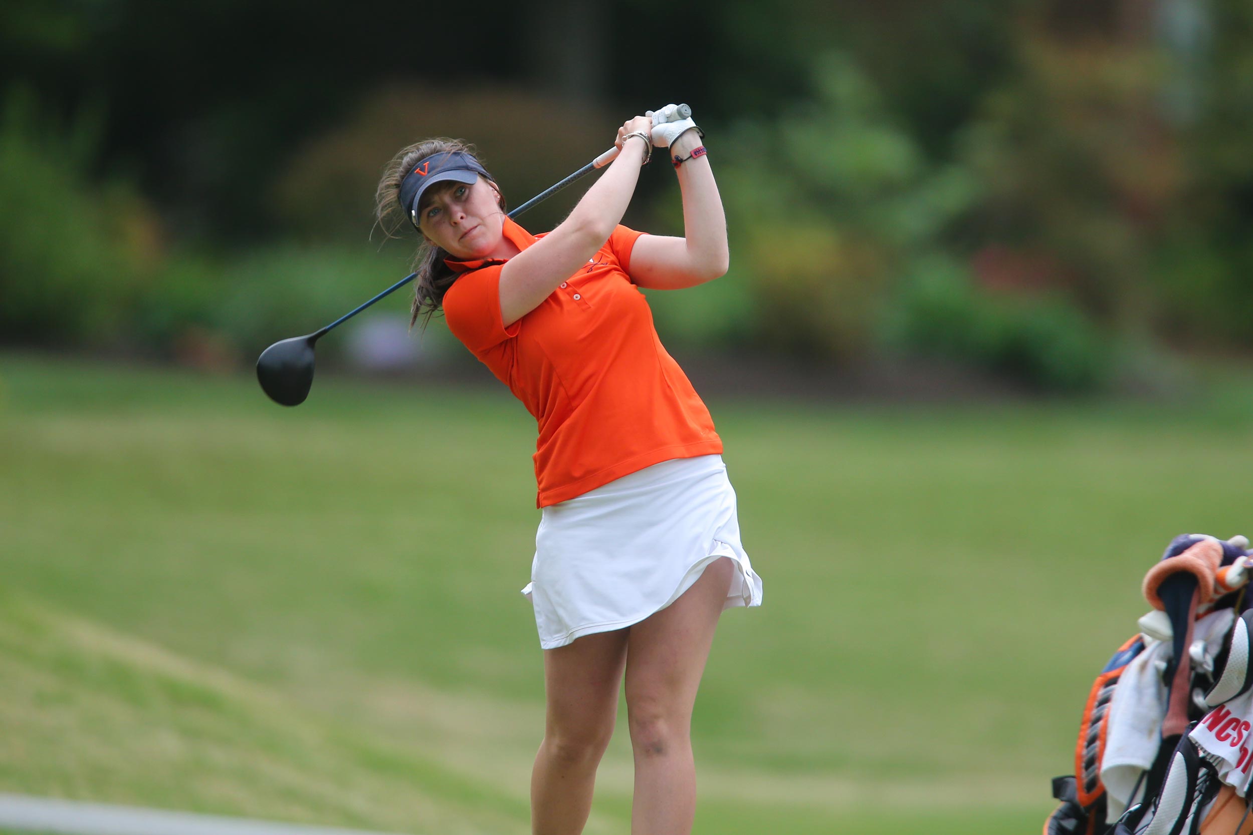 Brittany Altomare swinging a golf club