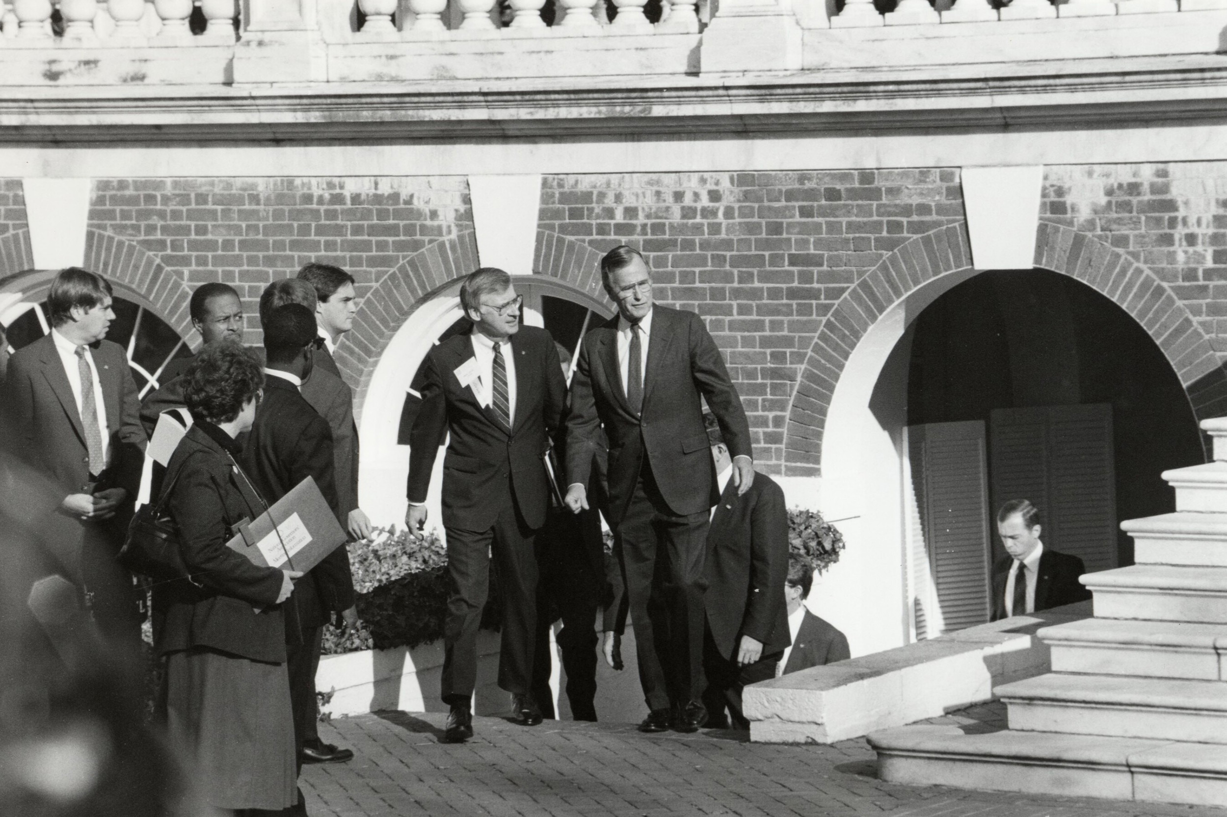 George H.W. Bush walking up the steps of the Rotunda