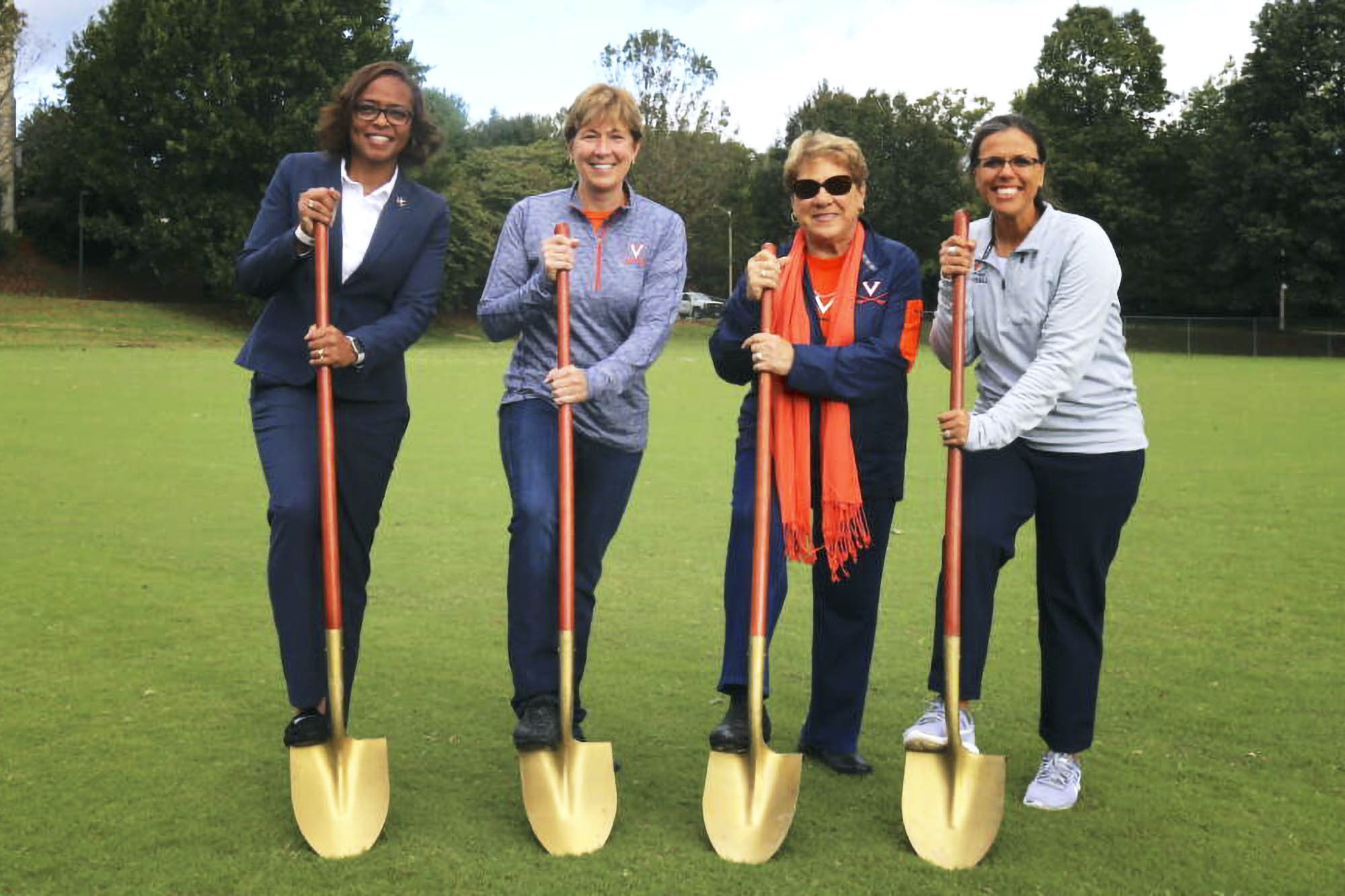 Carla Williams, Lisa Palmer, Fran Palmer, Joanna Hardin all hold golden shovels while they breakground at the Palmer Park in 2018