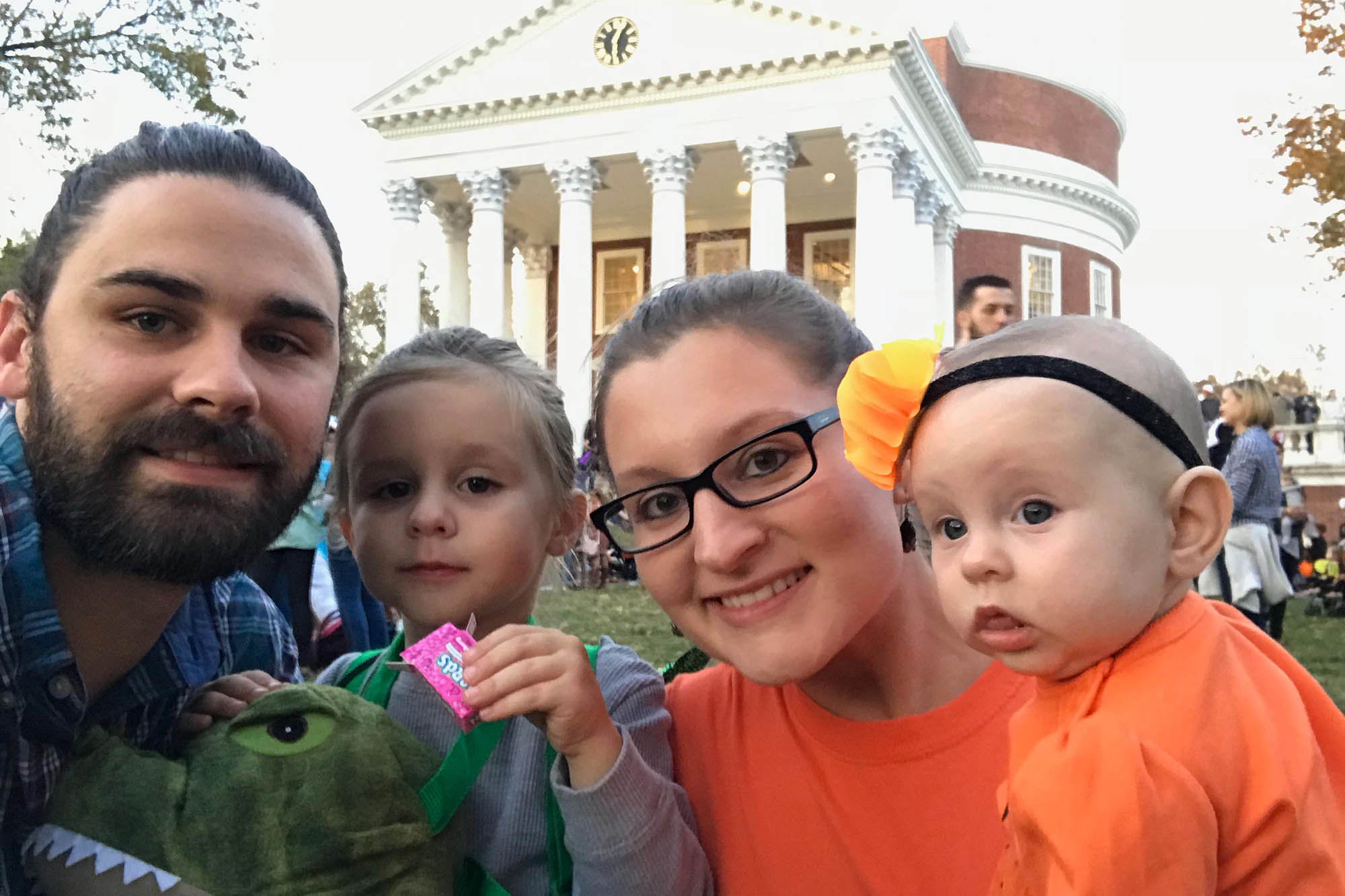 Casedy Thomas, second from right, with her husband, Matthew, and their two children, in front of the Rotunda