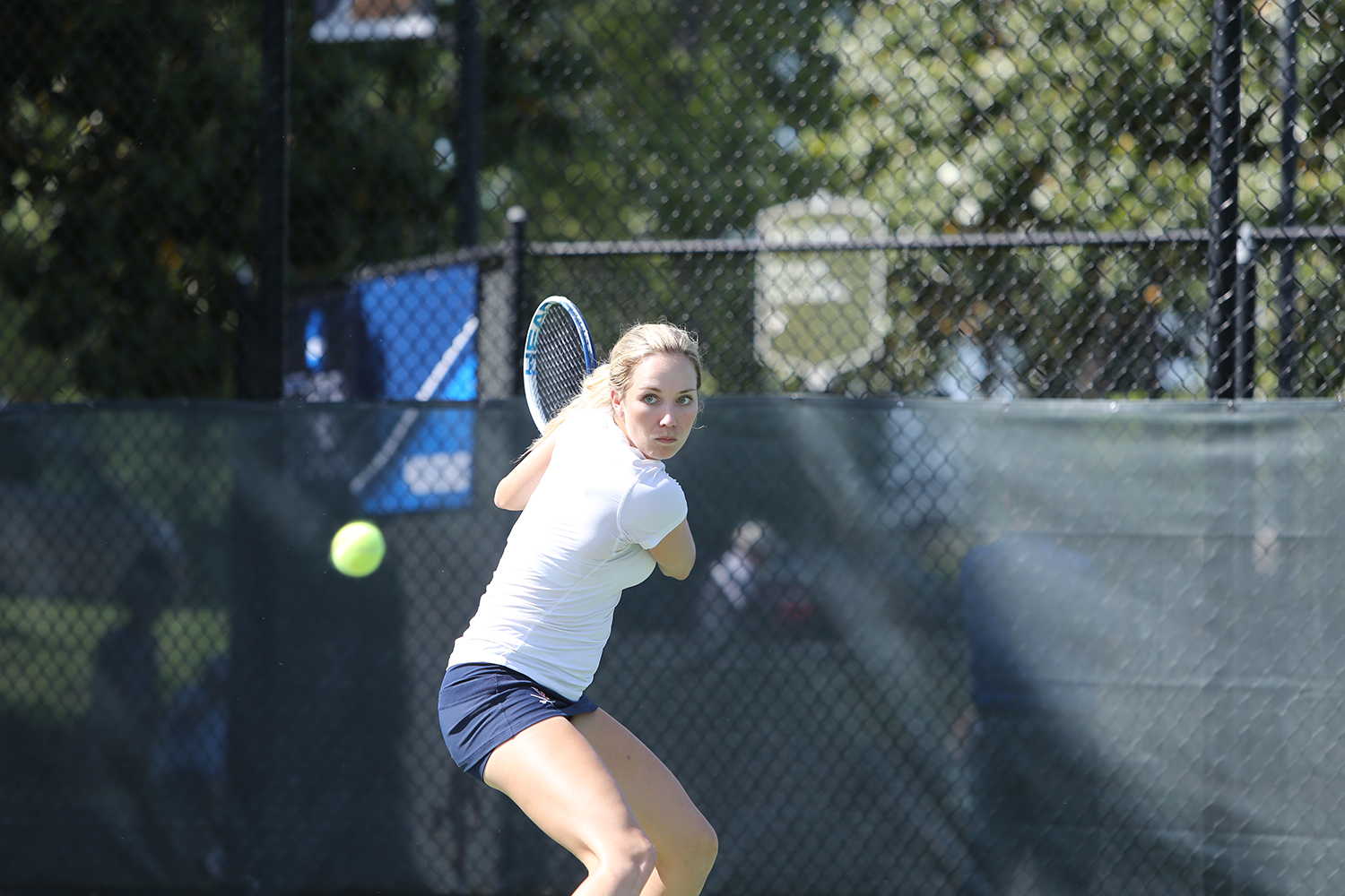 Danielle Collins hitting a tennis ball