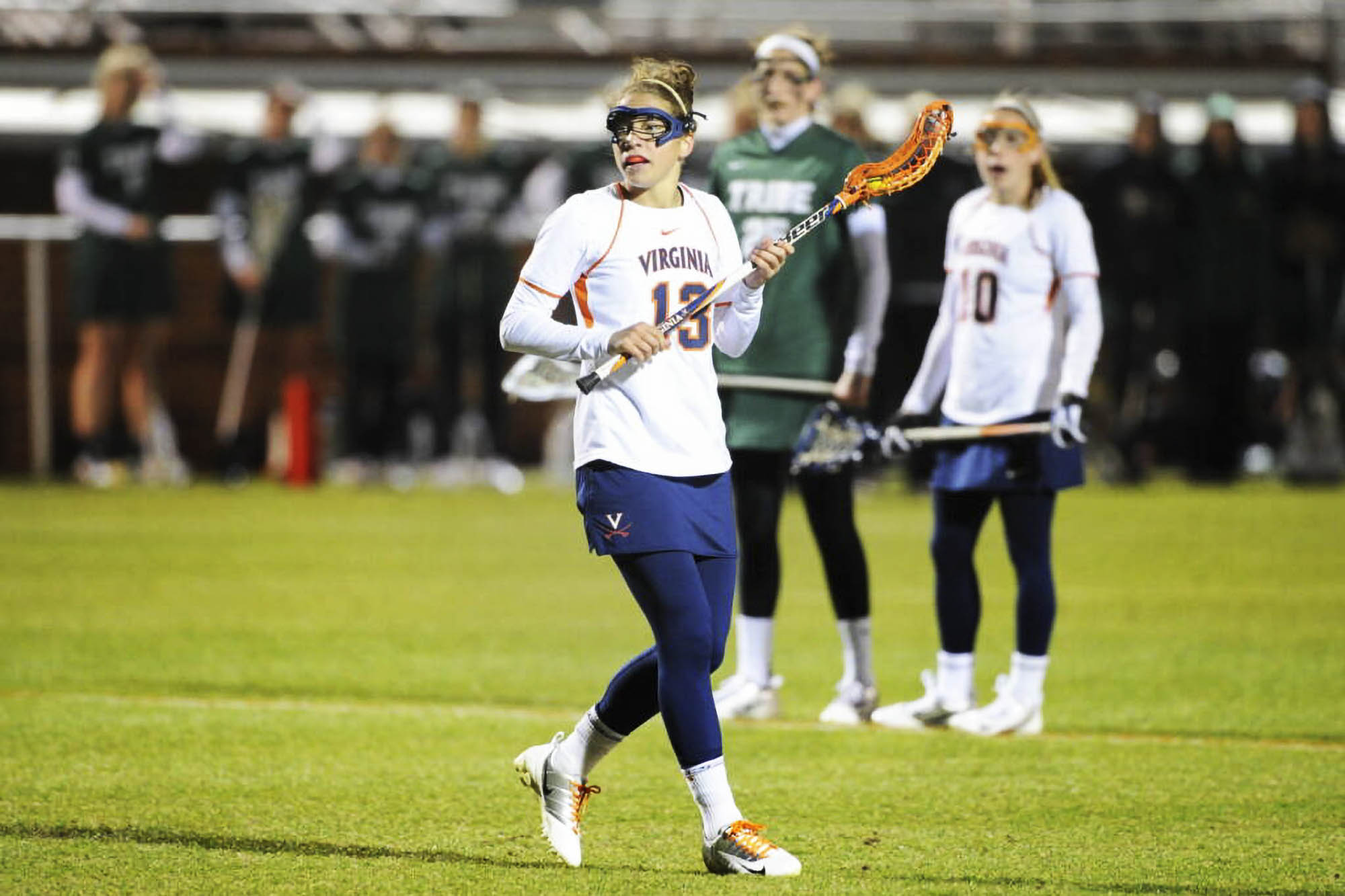 Dana Boyle playing Lacrosse in UVA uniform