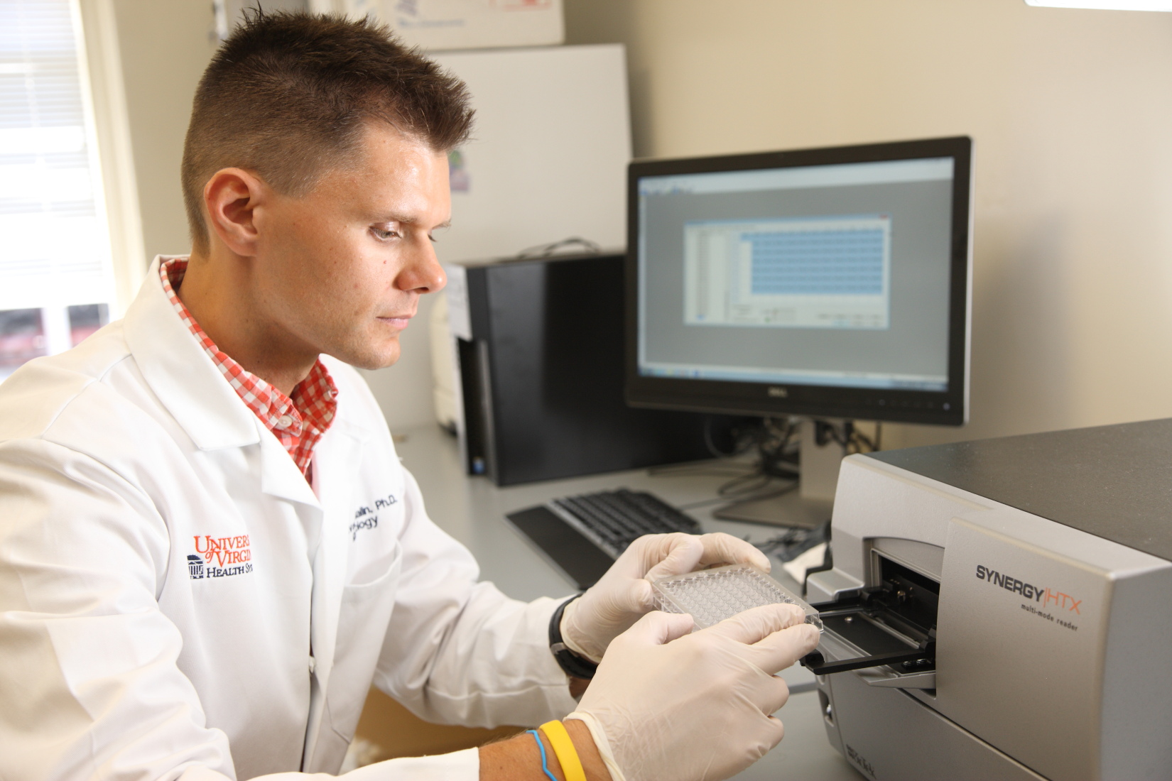 Kinesiologist Steven K. Malin working in the lab