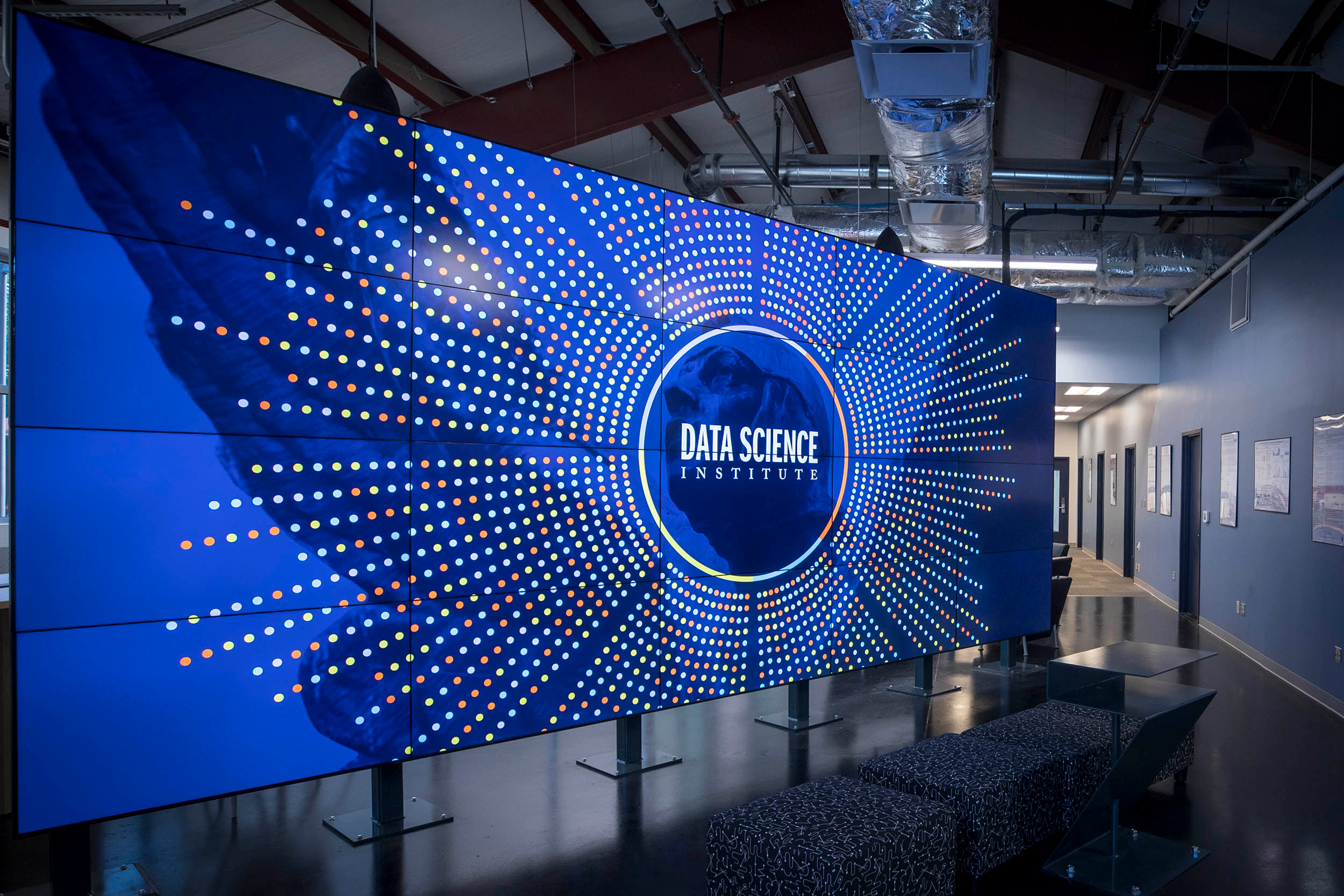 Digital Screens show hundreds of dots with the text Data Science Institute 