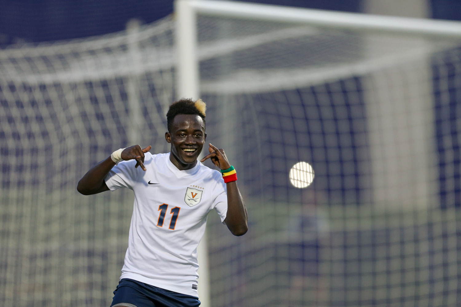 Edward Opoku celebrates on the soccer field