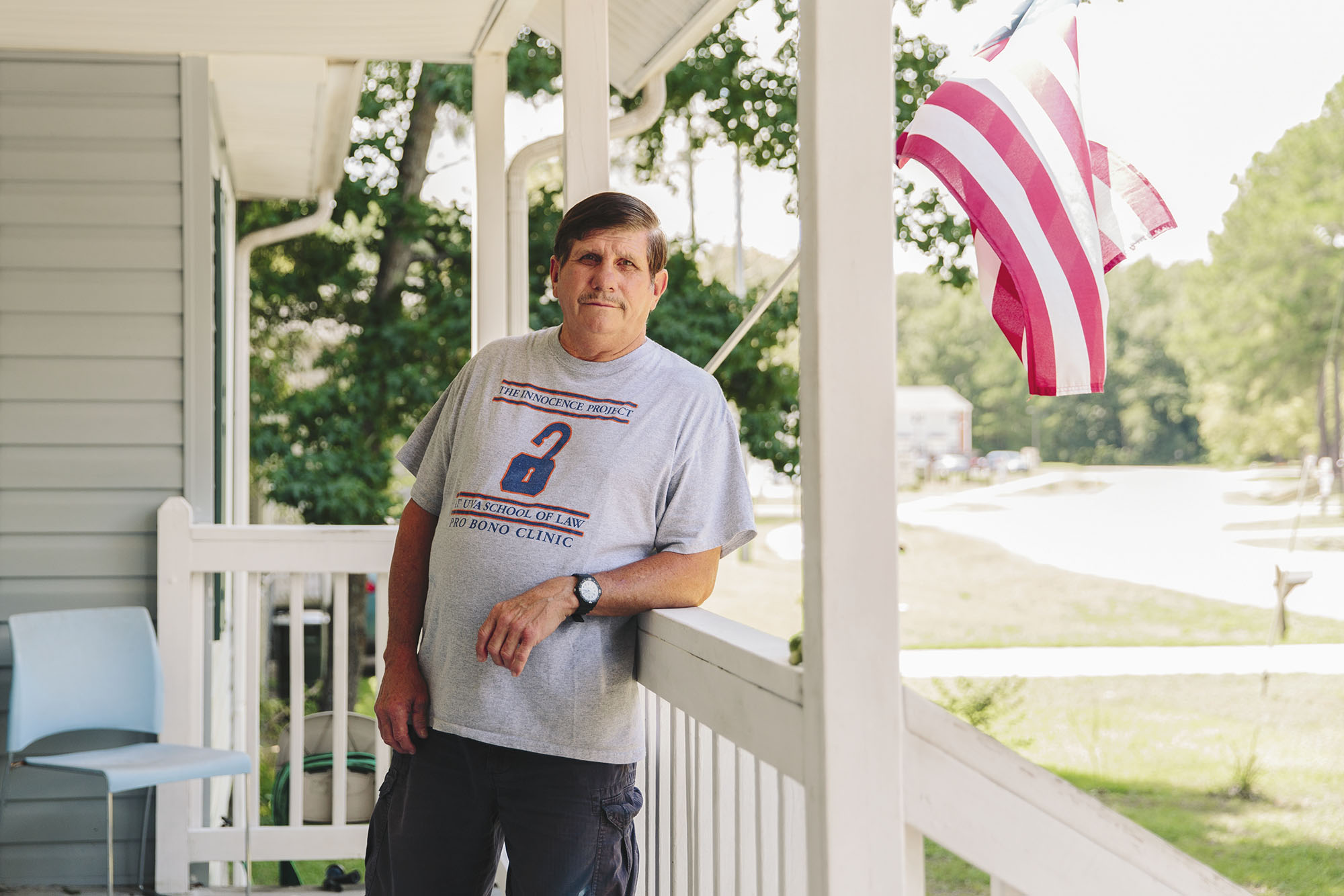 Emerson Stevens standing on front porch of home