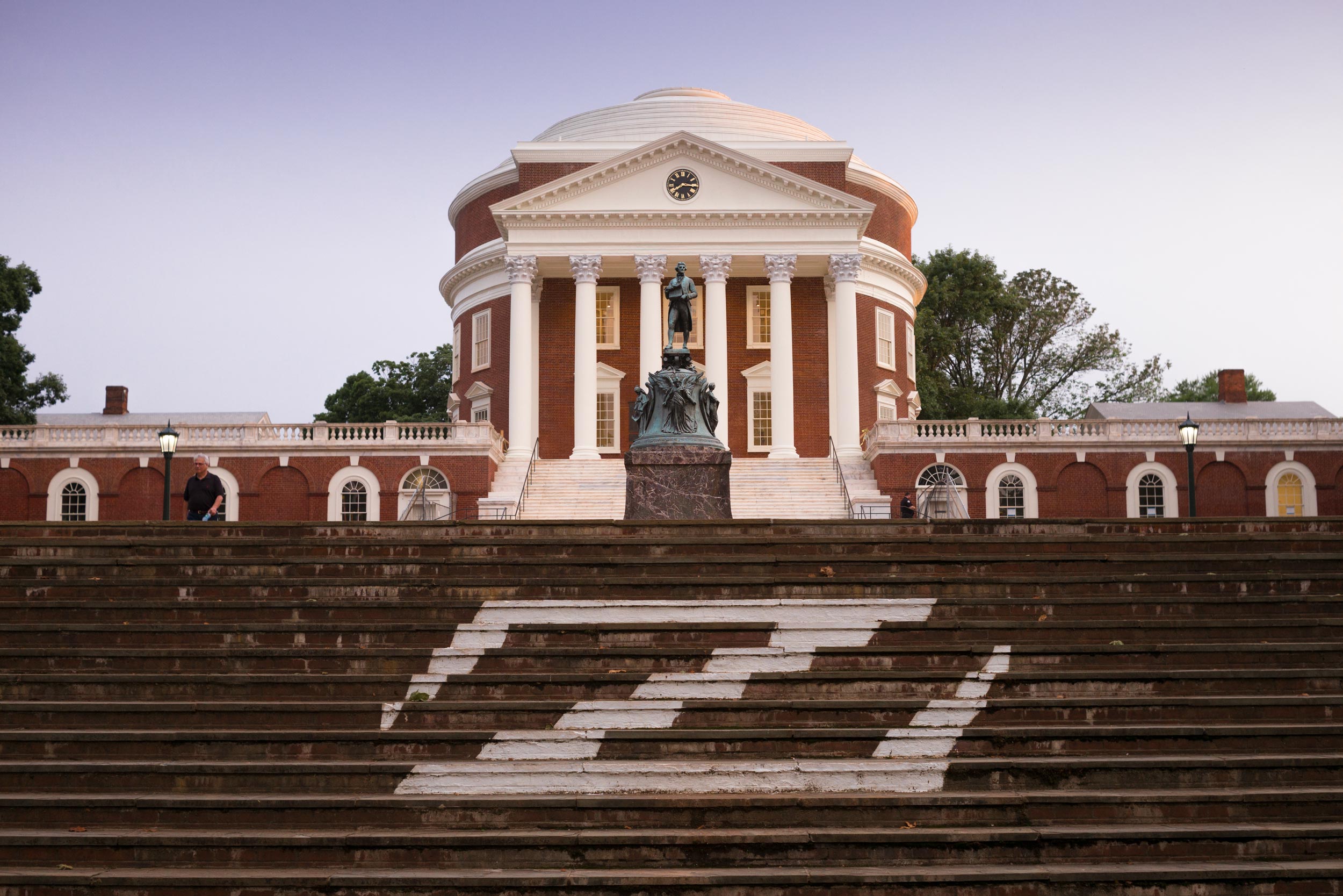 Thomas Jefferson Stature standing in front of the Rotunda with a Z on the steps