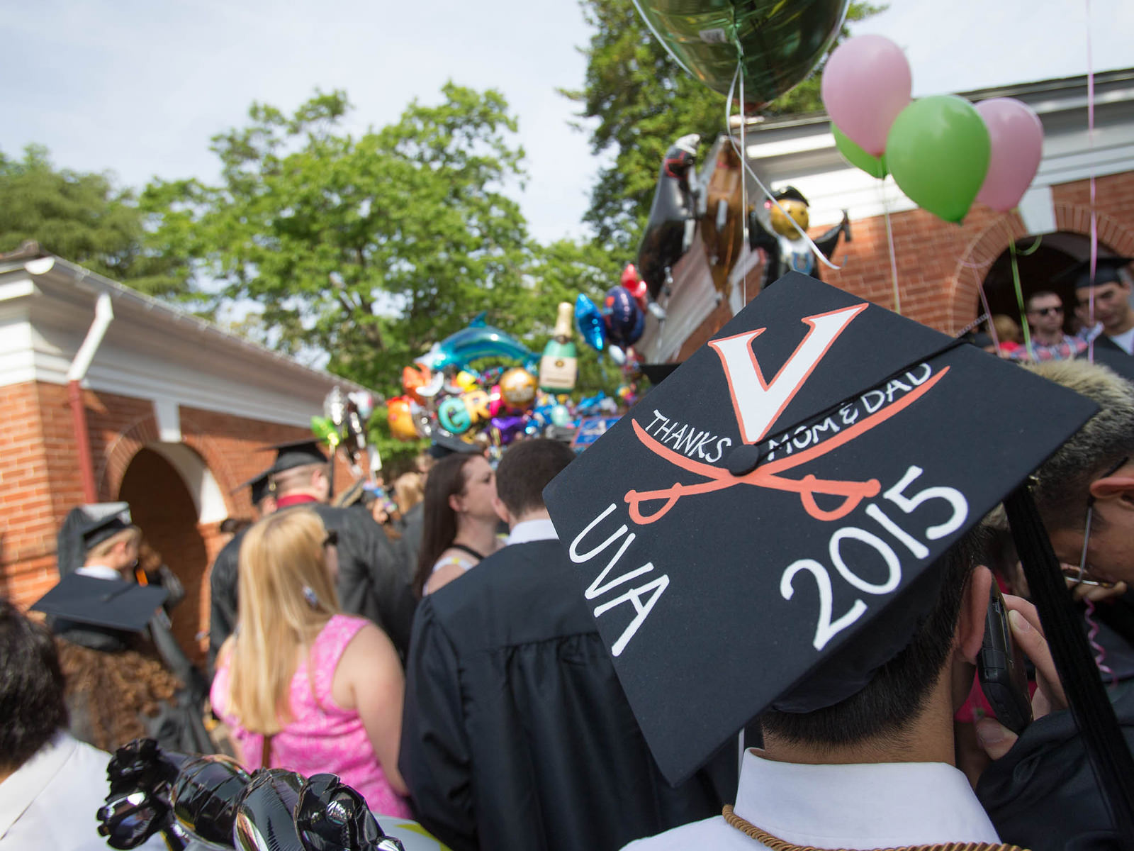 Graduation cap reads. Thanks mom & dad UVA 2015