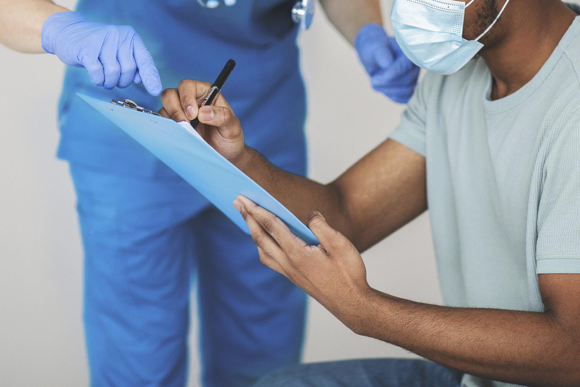 Patient filling out medical paperwork