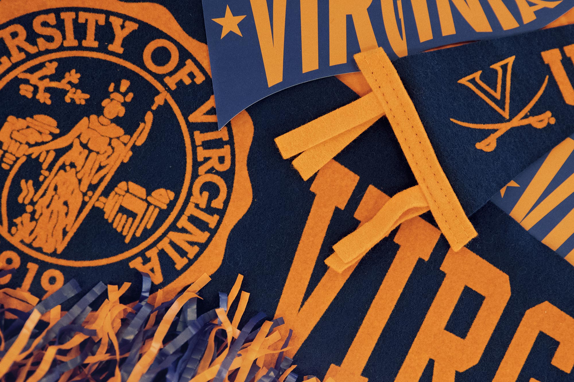 collage of UVA flags and UVA seal