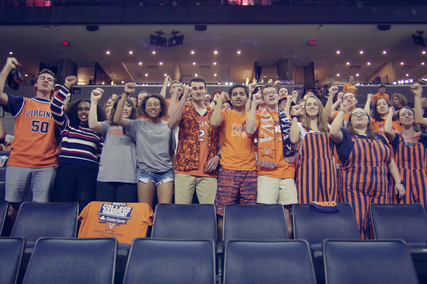 The Hoo Crew cheering during a basketball game