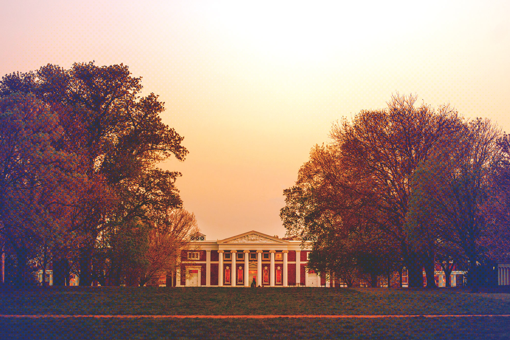 Building on grounds at sunset