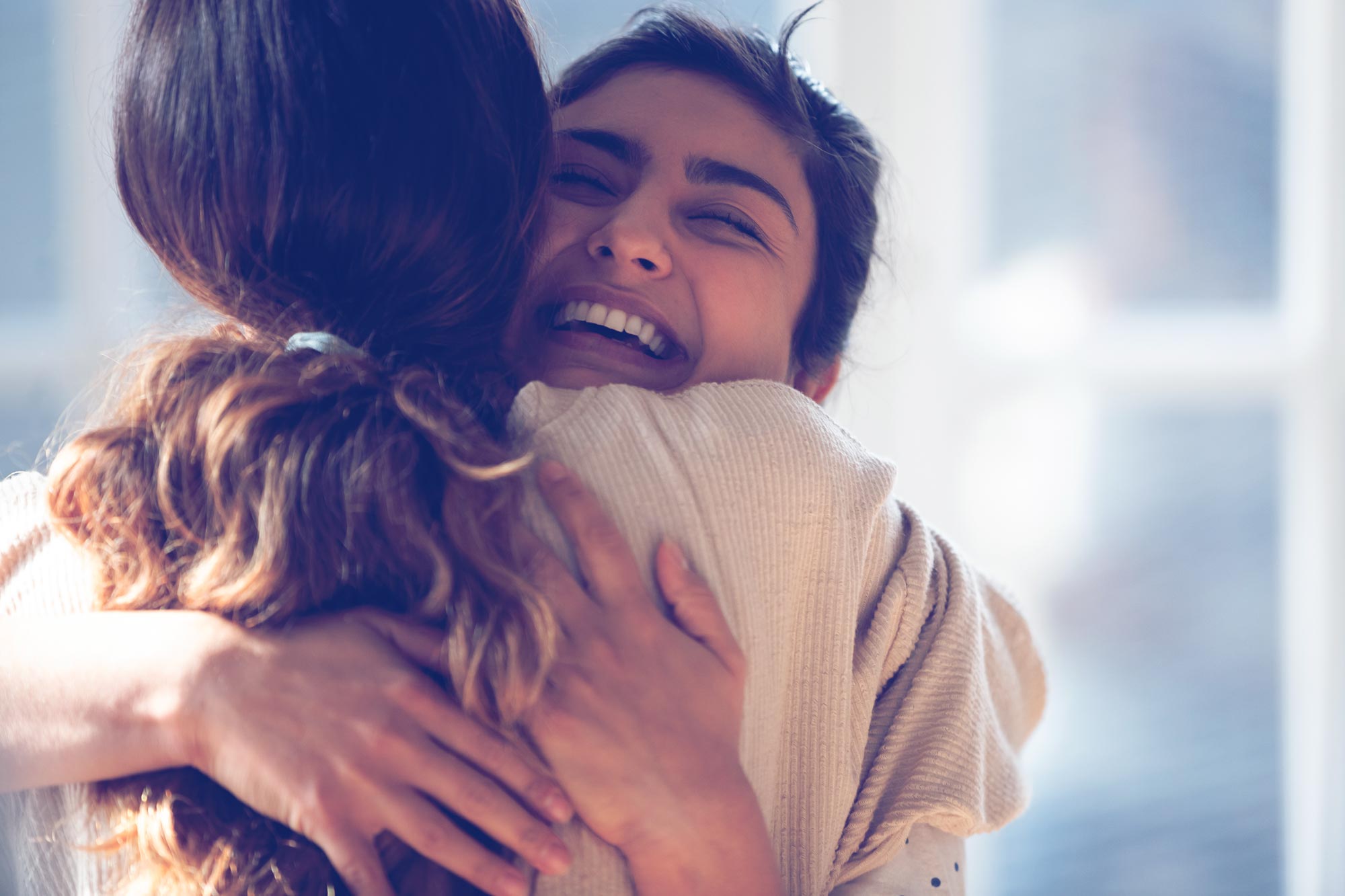 Two Sad Girls Hugging 