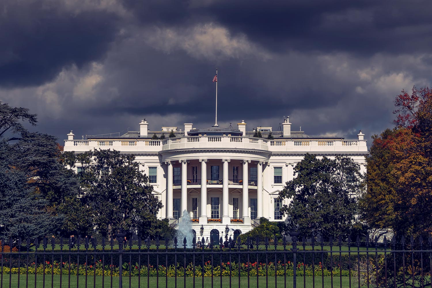 The White House with Dark storm clouds above