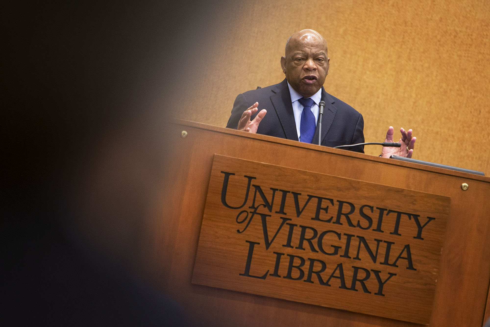 John Lewis speaking at a podium giving a speech 